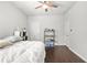 Bright bedroom features a ceiling fan, light walls, and hardwood floors at 200 Cherokee Reserve Cir, Canton, GA 30115