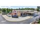 A Chick-fil-A restaurant, featuring a drive-thru and outdoor seating area, on a sunny day at 200 Cherokee Reserve Cir, Canton, GA 30115