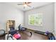 A home gym featuring workout equipment and hardwood flooring at 200 Cherokee Reserve Cir, Canton, GA 30115