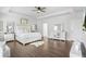 Main bedroom features hardwood floors, tray ceiling, and ensuite bathroom at 200 Cherokee Reserve Cir, Canton, GA 30115