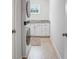 Laundry space with stackable washer and dryer, granite countertops and neutral color palette at 421 Retreat Ln, Canton, GA 30114