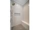 Modern tiled shower features a bench, handheld sprayer, and built-in niche at 421 Retreat Ln, Canton, GA 30114