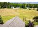 Scenic view of the backyard and neighboring homes, showcasing a serene and spacious setting at 1050 Denton Rd, Douglasville, GA 30134