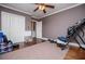 Spacious bedroom with hardwood floors, ceiling fan, closet doors and neutral toned walls at 1050 Denton Rd, Douglasville, GA 30134
