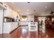 Spacious kitchen featuring a large island, stainless steel appliances, and custom white cabinetry at 1050 Denton Rd, Douglasville, GA 30134