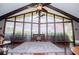Bright living room featuring high ceilings, large windows, and hardwood floors at 1050 Denton Rd, Douglasville, GA 30134