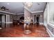 Main bedroom featuring hardwood floors, recessed lighting, ensuite bathroom, and an office space at 1050 Denton Rd, Douglasville, GA 30134