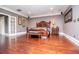 Large main bedroom with hardwood floors, an ensuite bathroom, and recessed lights at 1050 Denton Rd, Douglasville, GA 30134