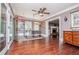 Sun room with hardwood floors, french doors, and view of the living room at 1050 Denton Rd, Douglasville, GA 30134