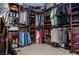 Well-organized walk-in closet with multiple shelves and rods for clothing storage at 1050 Denton Rd, Douglasville, GA 30134