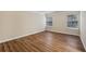 Bright bedroom with hardwood floors, neutral paint, and plenty of natural light at 2159 Meadow Peak Rd, Duluth, GA 30097