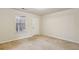 Well-lit bedroom featuring a window and a door to the outside at 2159 Meadow Peak Rd, Duluth, GA 30097