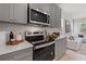 Well-equipped kitchen with modern appliances and sleek countertops at 3136 Washburn Se St, Atlanta, GA 30354