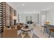 Open living area with wine rack, dining table, and stylish contemporary furnishings at 3136 Washburn Se St, Atlanta, GA 30354