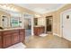 Bathroom featuring tile floors, dual sinks, and a glass-door shower at 3480 Indian Shoals Rd, Dacula, GA 30019