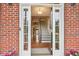 Grand foyer featuring a staircase and hardwood floors at 3480 Indian Shoals Rd, Dacula, GA 30019