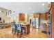 Spacious kitchen with stainless steel appliances and a center island with bar seating at 3480 Indian Shoals Rd, Dacula, GA 30019
