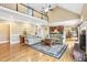 Spacious living room with vaulted ceilings and a beautiful decorative rug at 3480 Indian Shoals Rd, Dacula, GA 30019