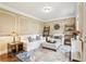 Cozy living room featuring stylish furniture, decor, and an inviting ambiance at 3480 Indian Shoals Rd, Dacula, GA 30019