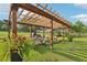 Lawn featuring a pergola with lounge seating and hammocks at 3480 Indian Shoals Rd, Dacula, GA 30019