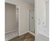 Bathroom featuring a shower and a bathtub at 403 Sonja Ln, Loganville, GA 30052