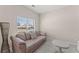 Comfortable bedroom with soft carpet, large window, and ample natural light at 403 Sonja Ln, Loganville, GA 30052