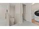 This hallway has three doorways, one to a bedroom, one to a bathroom, and one to the laundry room at 403 Sonja Ln, Loganville, GA 30052