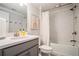 A clean bathroom with modern fixtures and a shower-tub combo at 710 Elmwood Way, Roswell, GA 30075