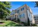 Charming brick townhome with manicured lawn and landscaped entrance in a desirable neighborhood at 710 Elmwood Way, Roswell, GA 30075
