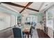 Charming dining room featuring a spacious table, bright windows, and elegant decor throughout the space at 1017 Preserve Park Dr, Loganville, GA 30052