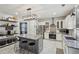 Modern kitchen featuring stainless steel appliances, a center island, and open shelving at 1017 Preserve Park Dr, Loganville, GA 30052