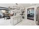 Open-concept kitchen and dining area featuring a large island and view to other rooms at 1017 Preserve Park Dr, Loganville, GA 30052