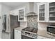 Modern kitchen with stainless steel appliances and range at 1017 Preserve Park Dr, Loganville, GA 30052