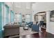 Bright living room with hardwood floors, tall ceilings and a view of the dining room at 1017 Preserve Park Dr, Loganville, GA 30052