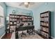 Cozy home office featuring a window view, a ceiling fan, and lots of bookshelf space at 1017 Preserve Park Dr, Loganville, GA 30052