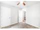 Bedroom with carpet, ceiling fan, and neutral paint color at 127 Danielle Ct, Villa Rica, GA 30180