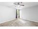 Bedroom with carpet, neutral paint, window with curtains, and ceiling fan at 127 Danielle Ct, Villa Rica, GA 30180