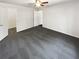 Carpeted bedroom with a ceiling fan, closet, and natural light at 1503 Colt Ridge Se Ln, Mableton, GA 30126