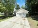 Charming home with a two-car garage and a well-maintained lawn at 1503 Colt Ridge Se Ln, Mableton, GA 30126