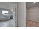 Modern bathroom boasts a soaking tub with marble surround and a walk-in closet at 157 Haverling Pass, Hampton, GA 30228