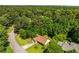 Overhead angle showcases this lovely home nestled in a wooded neighborhood at 2617 Laurel Woods Se Ln, Conyers, GA 30094
