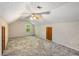 Large attic bedroom featuring carpet and a window at 2617 Laurel Woods Se Ln, Conyers, GA 30094