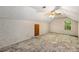 Large attic bedroom featuring carpet and a window at 2617 Laurel Woods Se Ln, Conyers, GA 30094