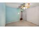 Comfortable bedroom with blue walls, carpeted floor, and a doorway to the hallway at 2617 Laurel Woods Se Ln, Conyers, GA 30094