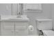 This bathroom has a toilet, sink, and cabinet, perfect for a small space at 4516 Creekwood Circle Nw, Kennesaw, GA 30152