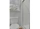 This bathroom features a toilet and a shower with white subway tile surround at 4516 Creekwood Circle Nw, Kennesaw, GA 30152