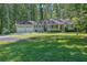 Charming house featuring an attached garage, lush lawn, and nicely landscaped surroundings at 4516 Creekwood Circle Nw, Kennesaw, GA 30152