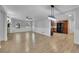 Spacious living room with hardwood floors open to the kitchen with stainless steel appliances at 4516 Creekwood Circle Nw, Kennesaw, GA 30152