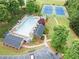 Aerial view showcasing community pool, tennis courts, and well-manicured landscaping at 75 Hunters Ct, Dallas, GA 30157