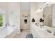 Bright bathroom with double vanity, soaking tub and natural light at 75 Hunters Ct, Dallas, GA 30157